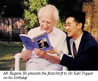 Photo: Ho presents Festschrift to Popper.